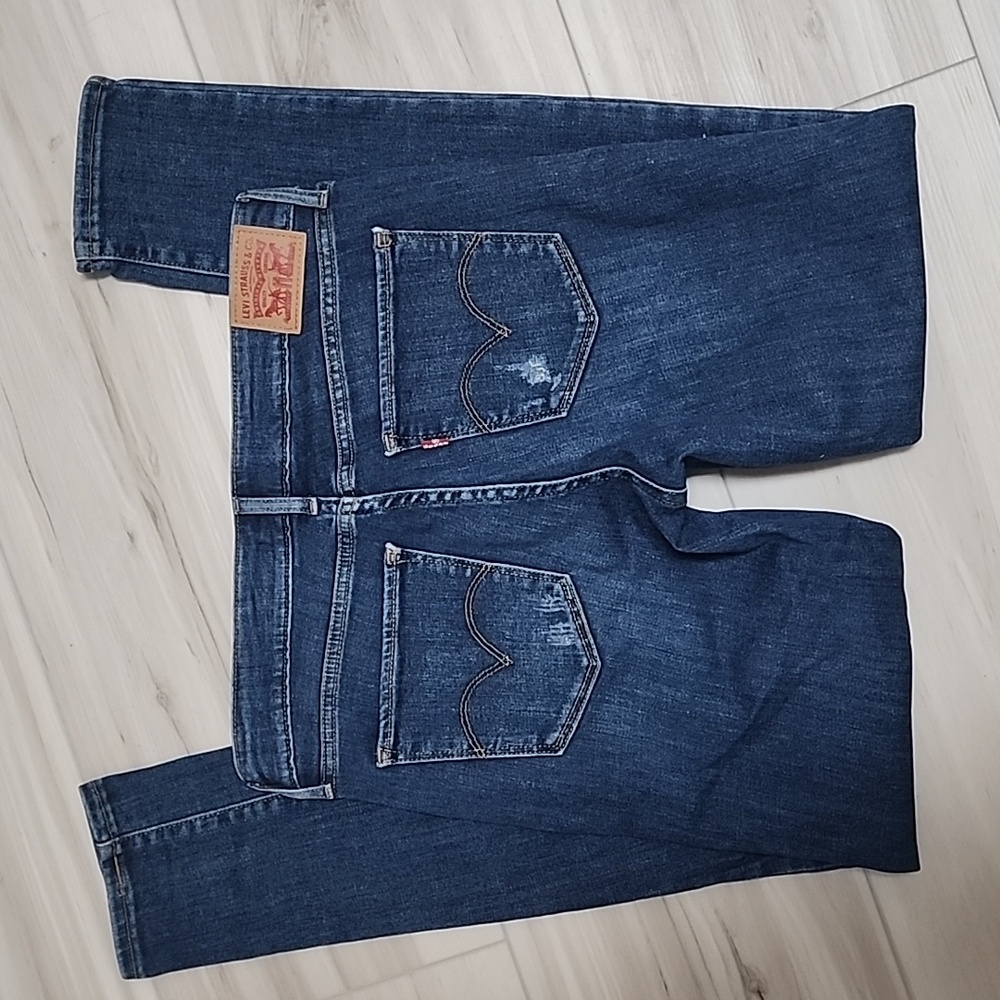 Levi's 711 skinny distressed medium wash jeans regular inseam. Size 28